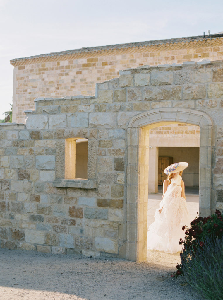 Bride walking outdoors at Sunstone Villa