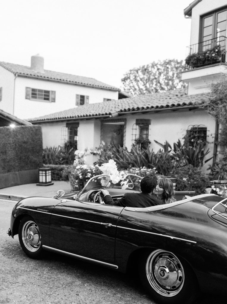 Bride and groom in car in Los Angeles by JS Rhos