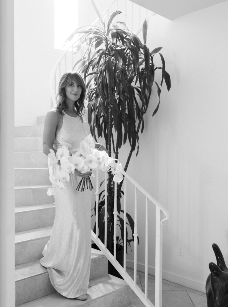 Classic Hollywood Bride walking down stairs in Sunset Marquis, Los Angeles by JS Rhos