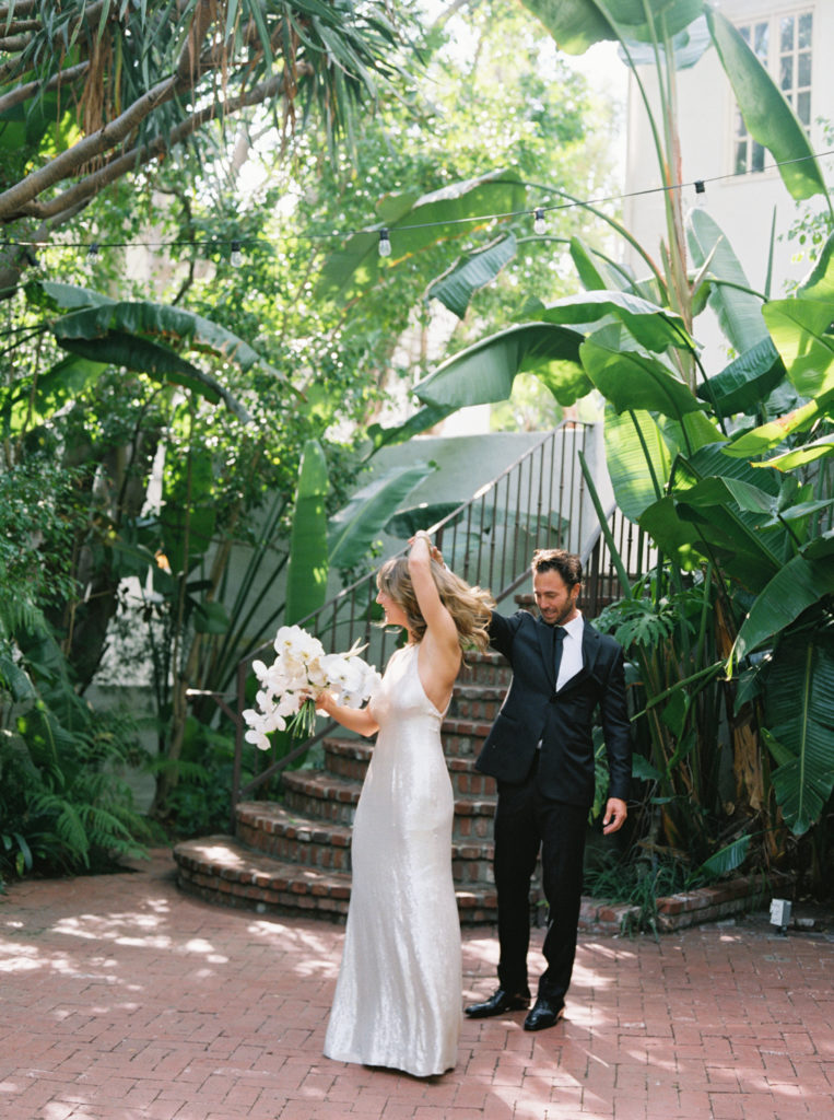 Bride and groom dancing at Sunset Marquis