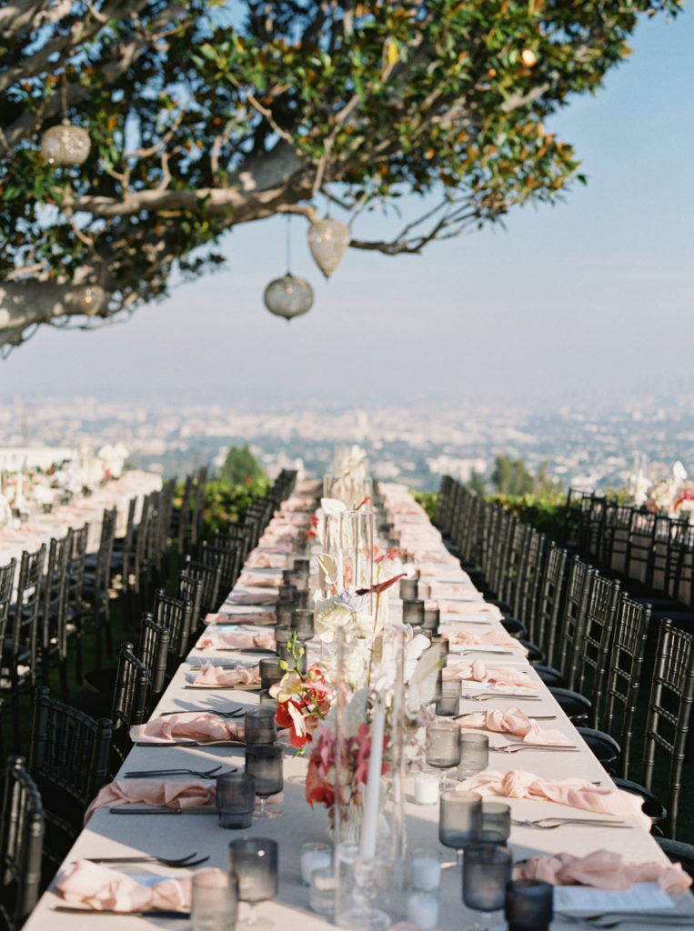 Classic hollywood wedding Long table view of wedding reception decor by JS Rhos in Los Angeles